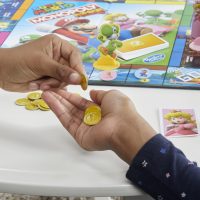 Monopoly Junior Super Mario Edition Board Game, Fun Kids' Ages 5 and Up, Explore The Mushroom Kingdom as Mario, Peach, Yoshi, or Luigi (Amazon Exclusive) - Image 5