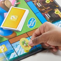 Monopoly Junior Super Mario Edition Board Game, Fun Kids' Ages 5 and Up, Explore The Mushroom Kingdom as Mario, Peach, Yoshi, or Luigi (Amazon Exclusive) - Image 7