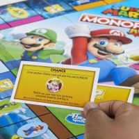 Monopoly Junior Super Mario Edition Board Game, Fun Kids' Ages 5 and Up, Explore The Mushroom Kingdom as Mario, Peach, Yoshi, or Luigi (Amazon Exclusive) - Image 3