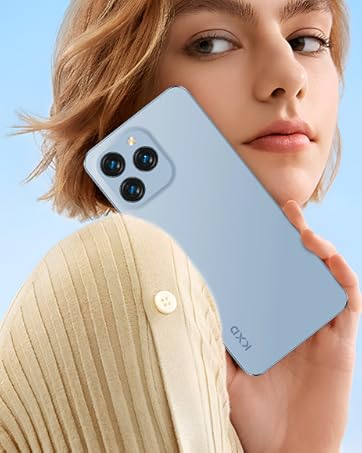Light blue smartphone case with triple camera cutout. Woman holding the phone, wearing a cream-colored sweater against a blue background.