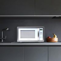 Farberware Countertop Microwave 1000 Watts, 1.1 cu ft - Microwave Oven With LED Lighting and Child Lock - Perfect for Apartments and Dorms - Easy Clean White, Platinum - Image 7