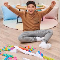 Spin Master Games, Lily Hevesh H5 Domino Creations 100-Piece Neon Dominoes Set, Building Toys for Kids & Family, Classic Activity Game, 1 & Up Players, for Ages 5 & Up - Image 8