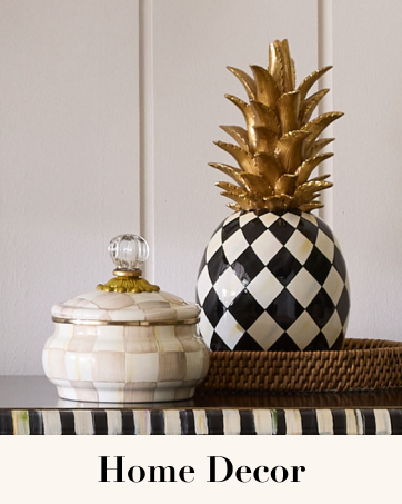 Iconic marquee pineapple with mocha check squashed pot.