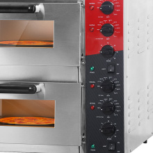 a close up of a toaster oven with a pizza on it