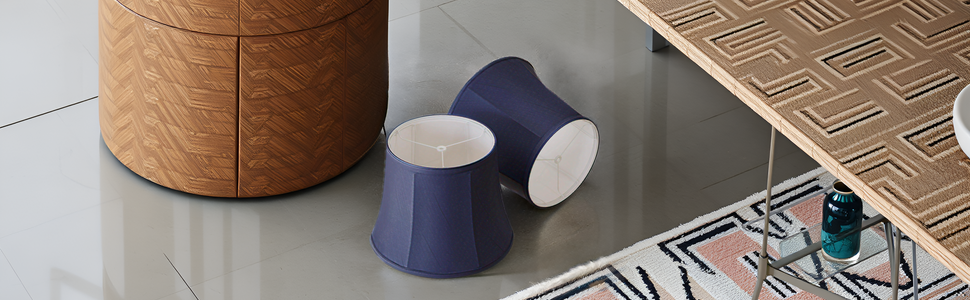 A cozy living room setting with a lamp illuminating the product on a side table.