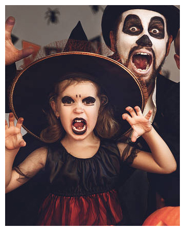 a little girl with her mouth open and a witch's mouth is in the background.