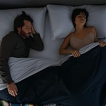 Couple sleeping on Purple mattress