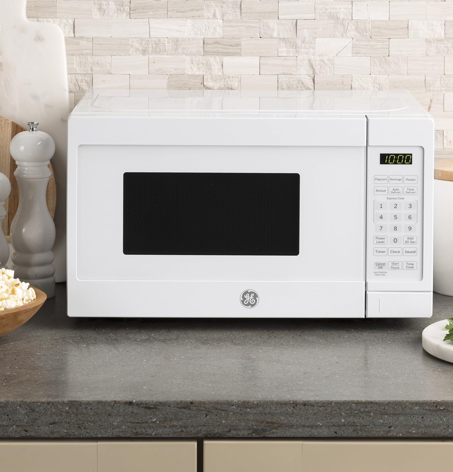 GE Countertop Microwave Oven | 0.7 Cubic Feet Capacity, 700 Watts | Kitchen Essentials for the Countertop or Dorm Room | White - Image 2