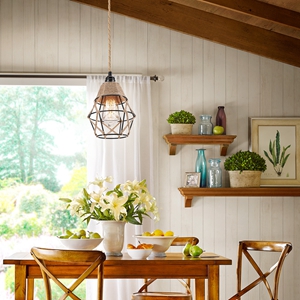 a dining room with a table and chairs.