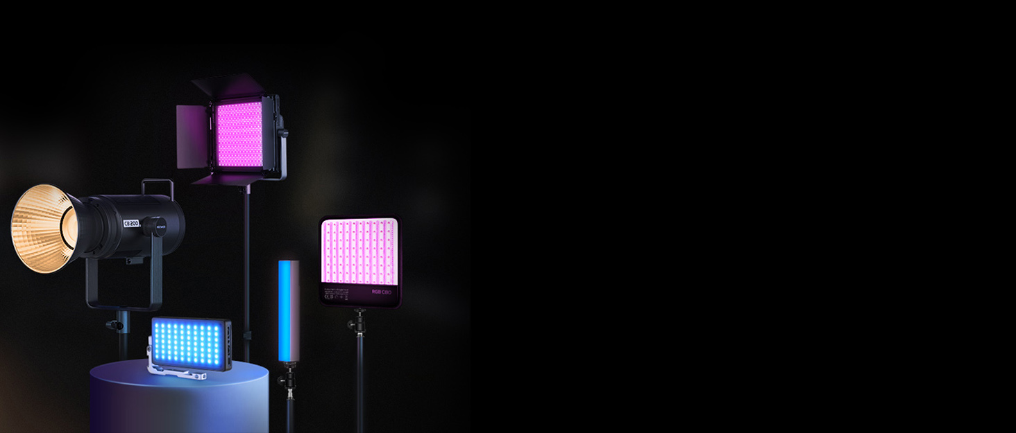 Collection of professional lighting equipment including LED panels in various shapes and sizes, emitting different colored lights against a black background.