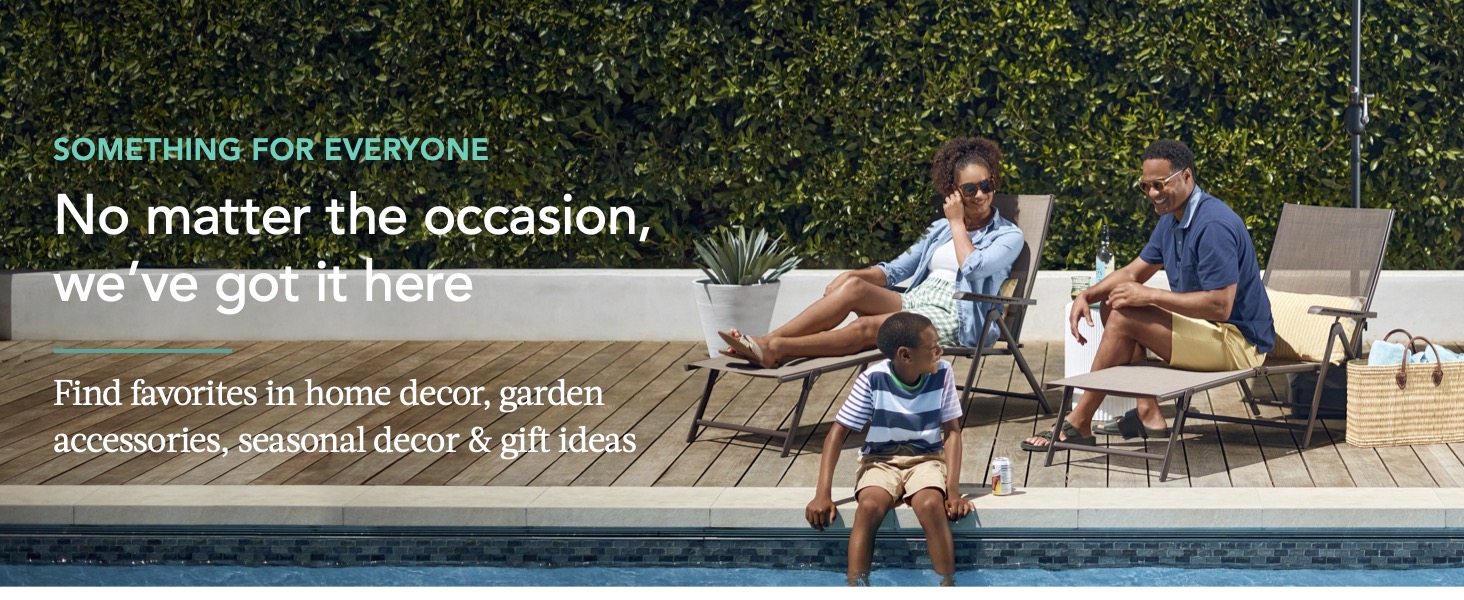 family relaxing in the patio by the pool