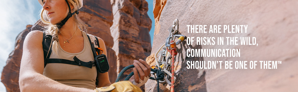 Women lead climbing belaying partner.